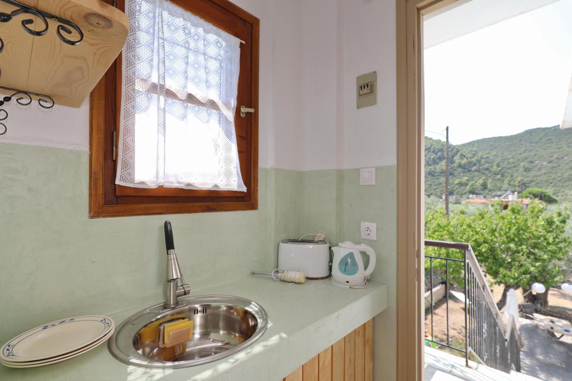 Skopelos Evergreen Apartments สตาฟิลอส ภายนอก รูปภาพ