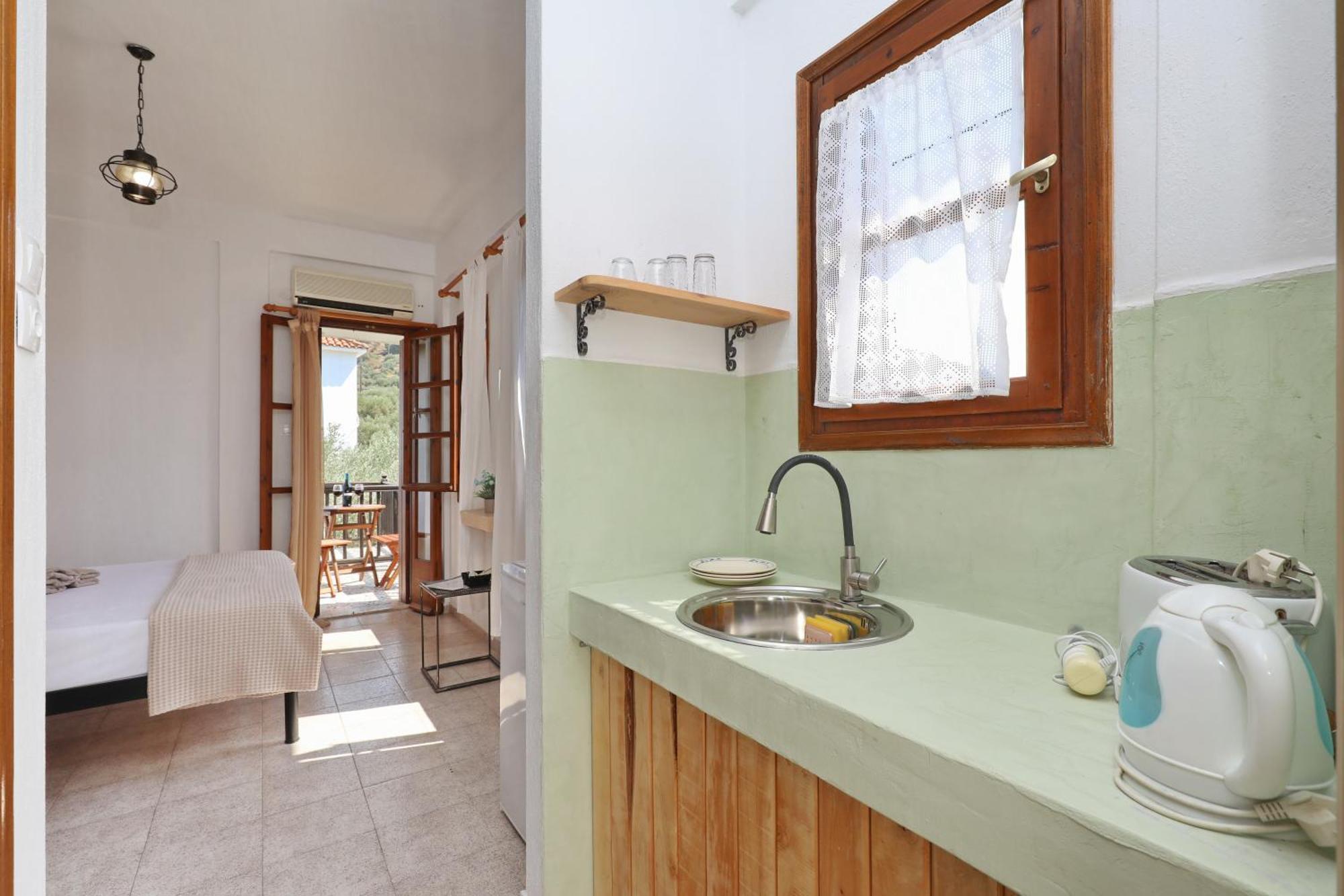 Skopelos Evergreen Apartments สตาฟิลอส ภายนอก รูปภาพ