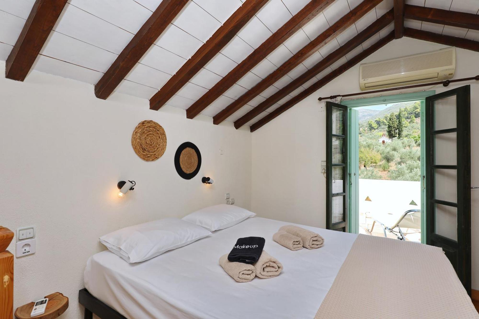Skopelos Evergreen Apartments สตาฟิลอส ภายนอก รูปภาพ