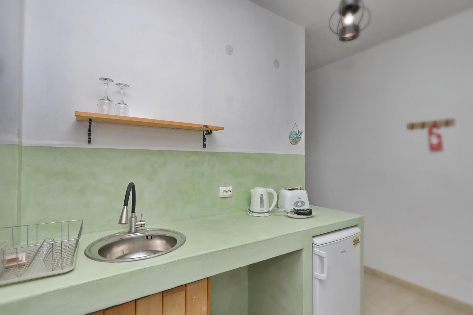 Skopelos Evergreen Apartments สตาฟิลอส ภายนอก รูปภาพ