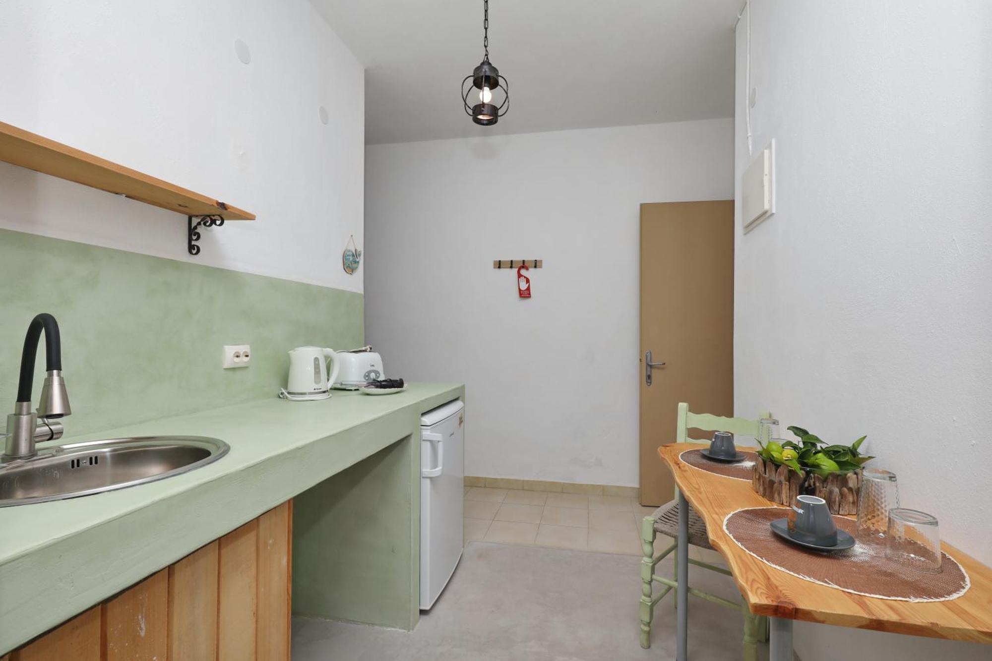 Skopelos Evergreen Apartments สตาฟิลอส ภายนอก รูปภาพ